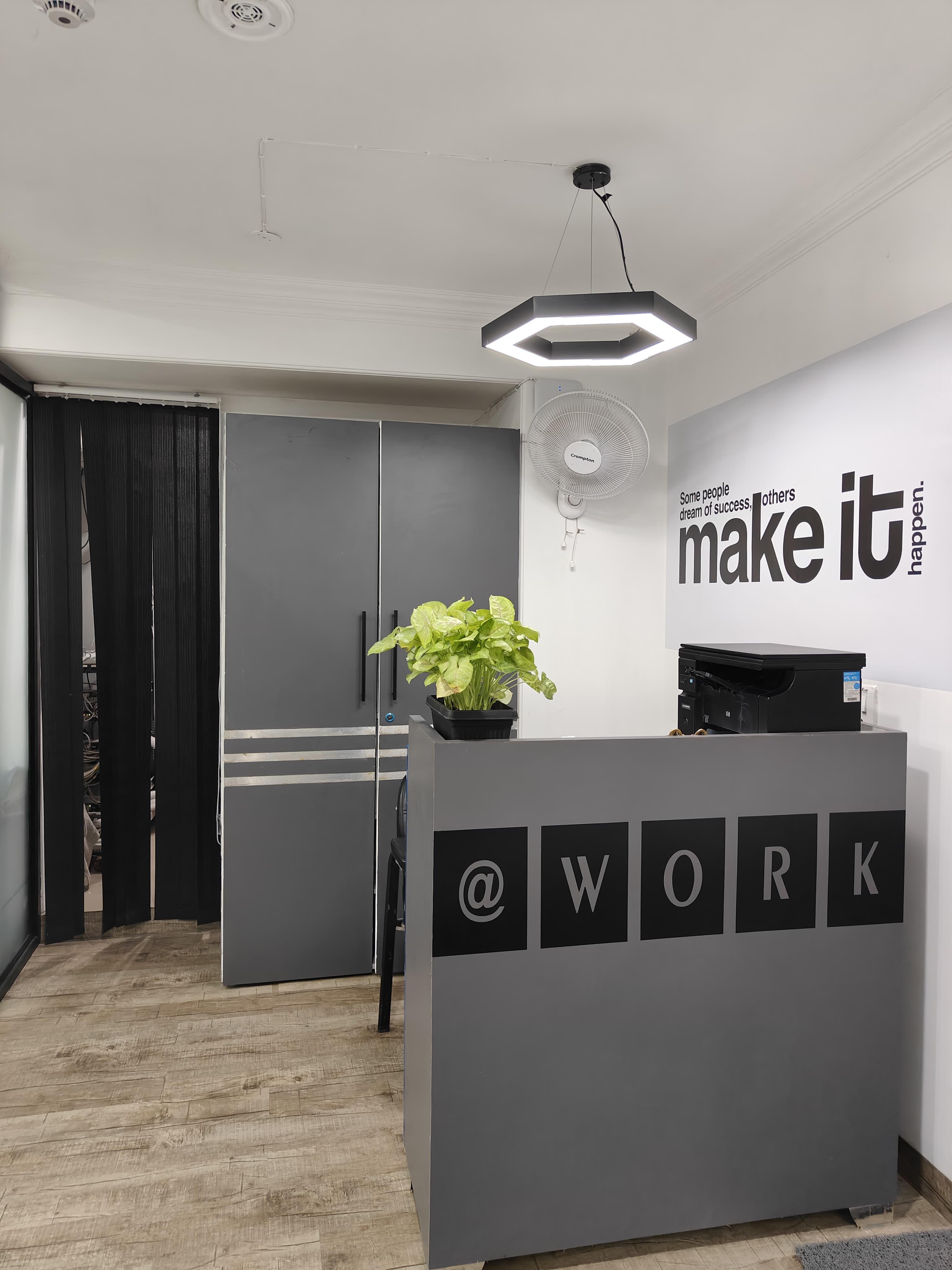 Branded reception desk at AtWork Co-Lab