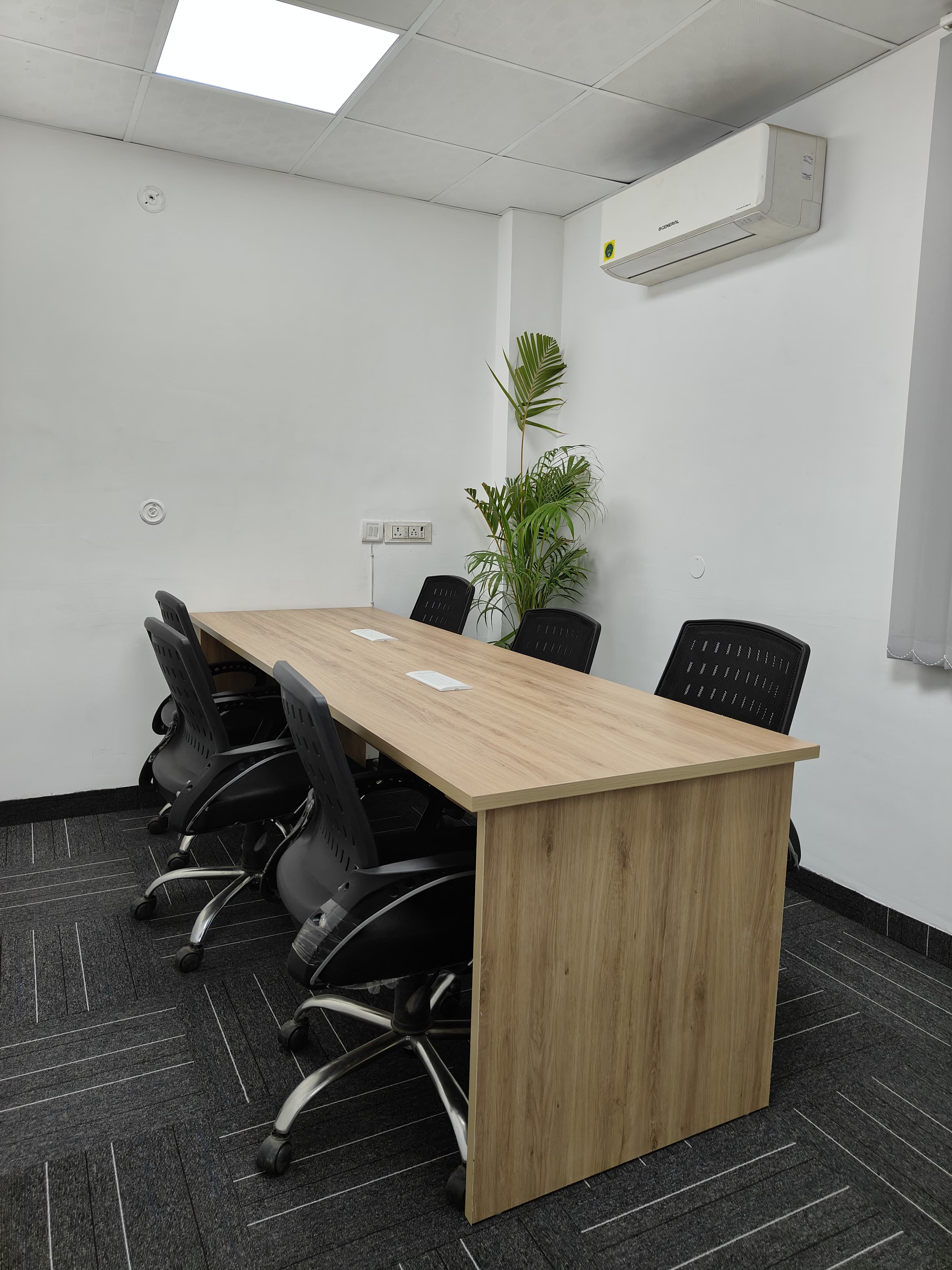 Open coworking floor at AtWork Co-Lab