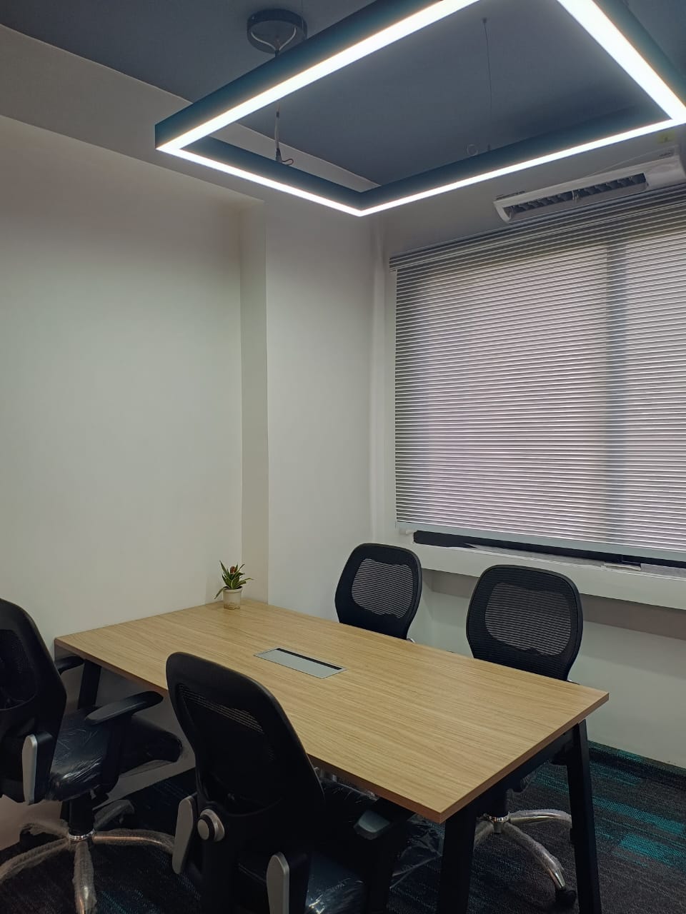 Conference room with seating at AtWork FinTech