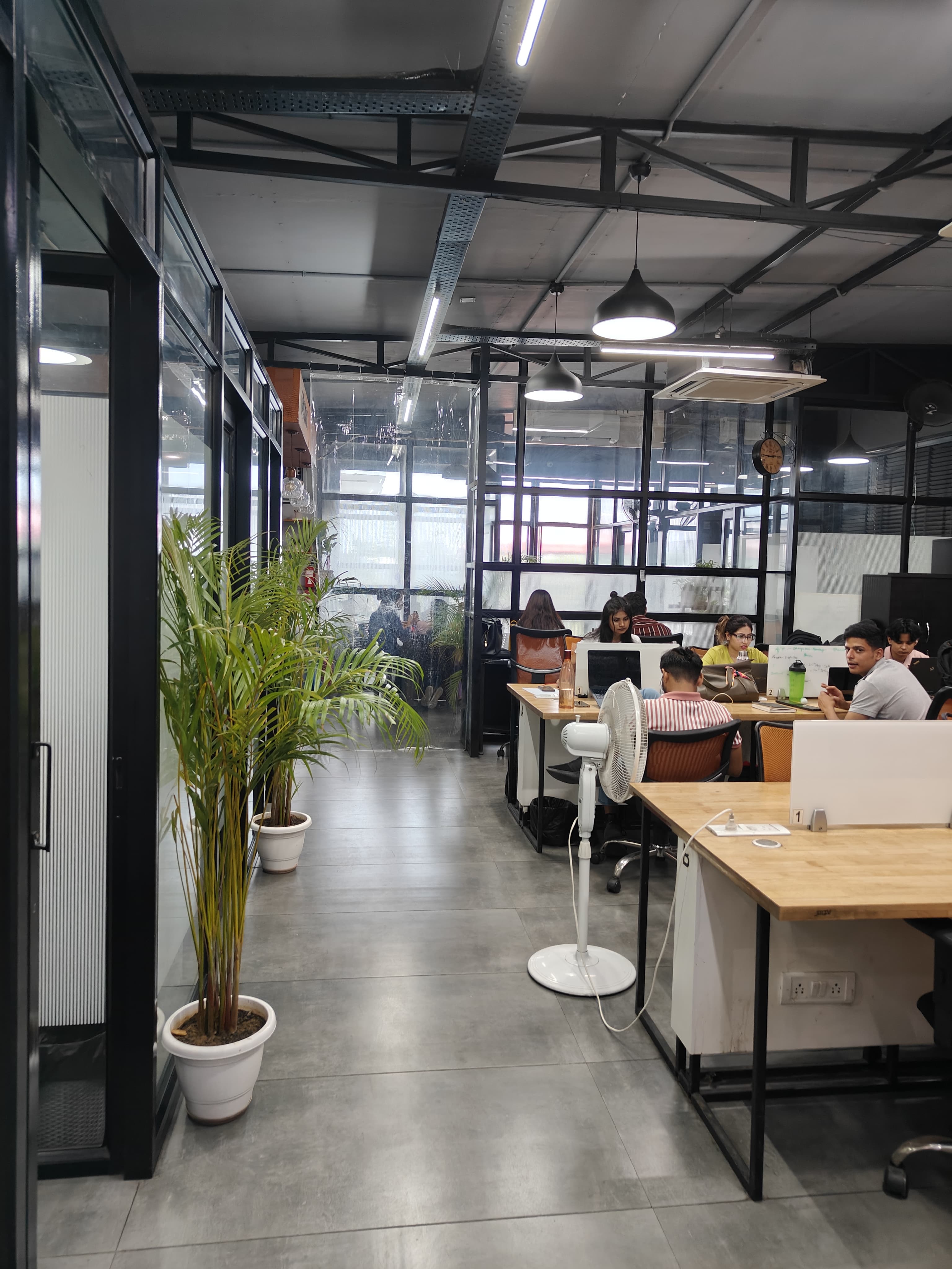 Open coworking seating on the 4th floor at AtWork Green House