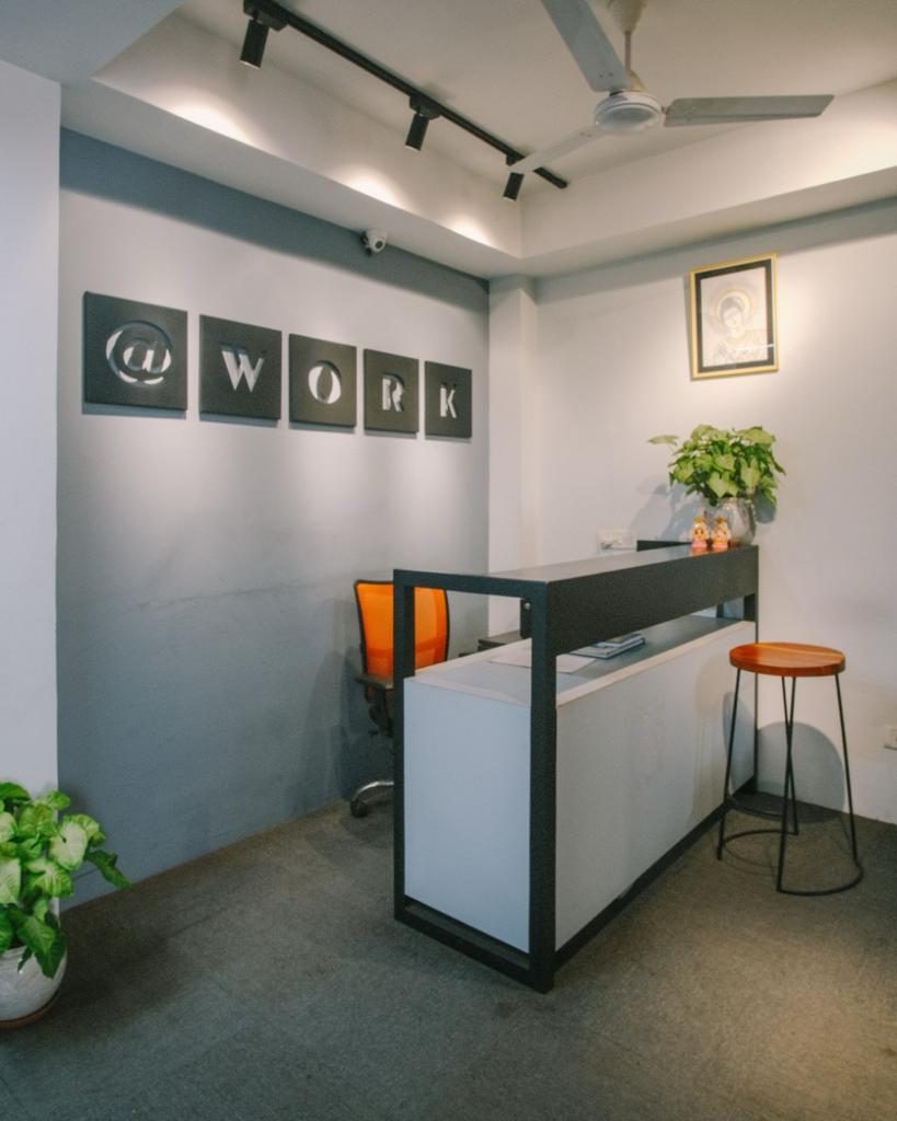 Reception desk and lobby at AtWork Green House